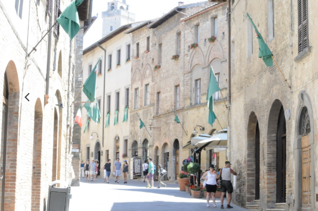 Street scene in Sienna, Italy with flags