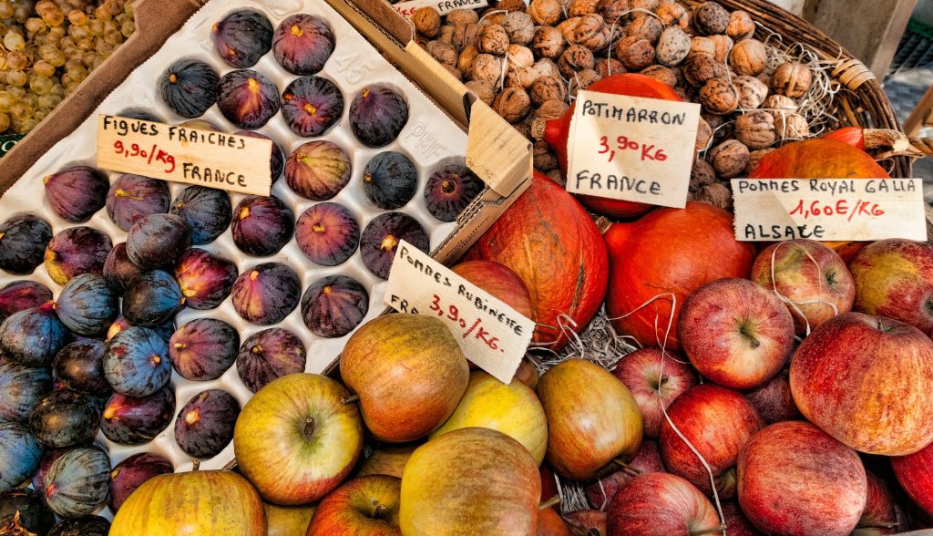 figs, pomegranite and apples in a farmers market in france